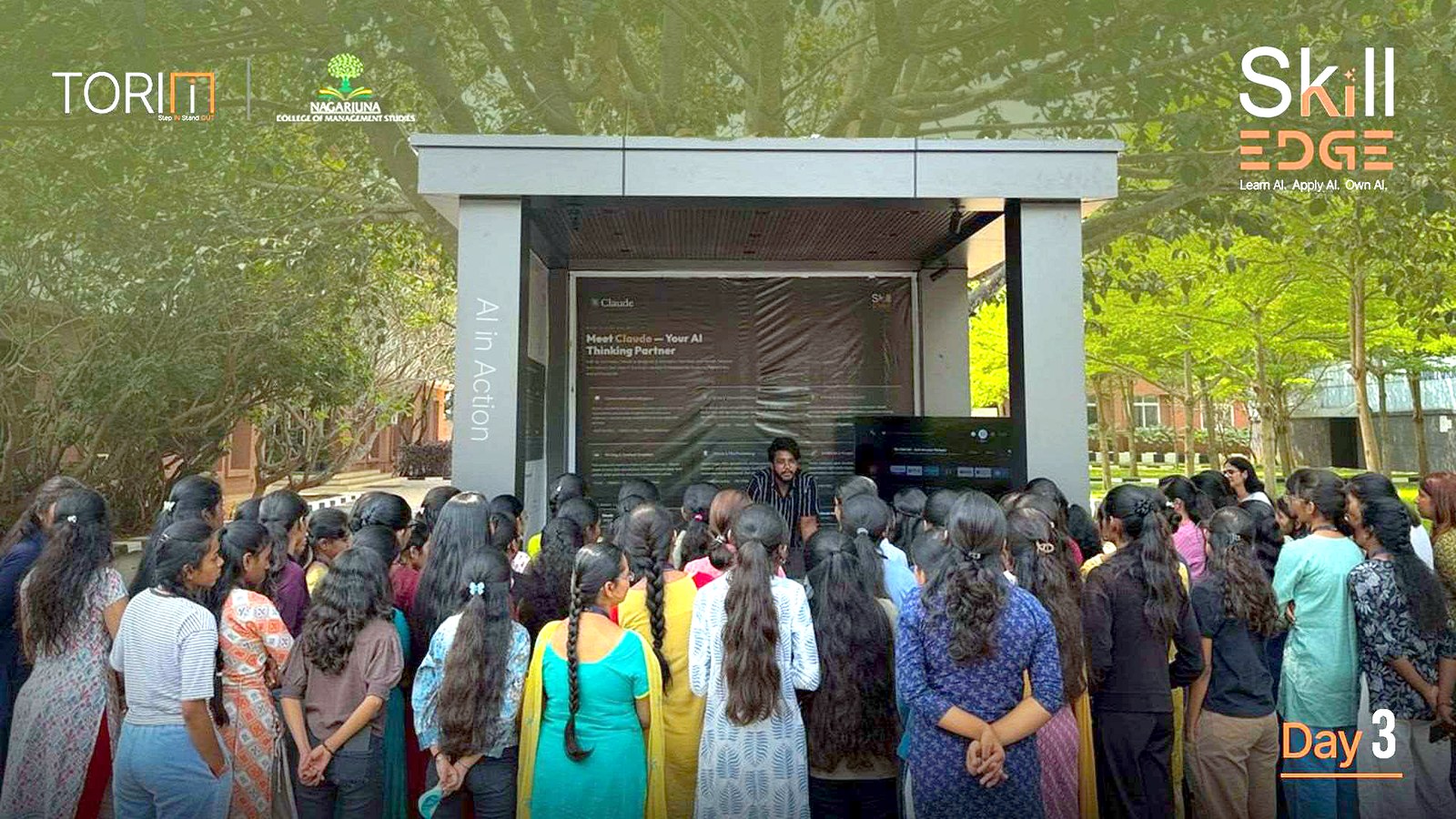 Students gathered at the Claude AI awareness kiosk at NTSquare, NCET