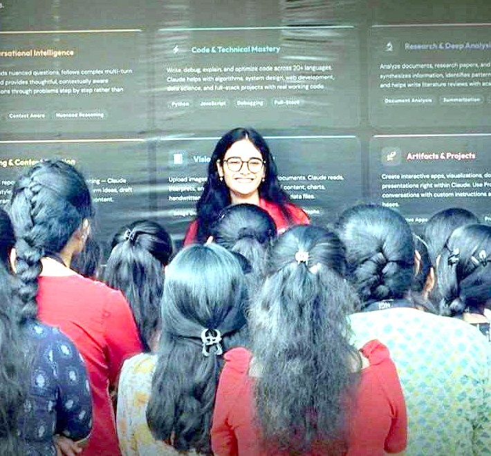 A presenter explaining Claude's capabilities to students